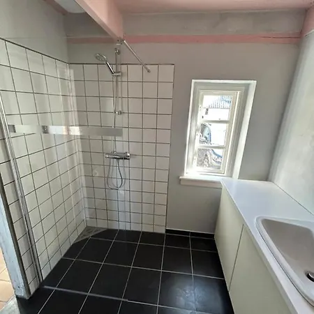 Det Gule Palae Нексё